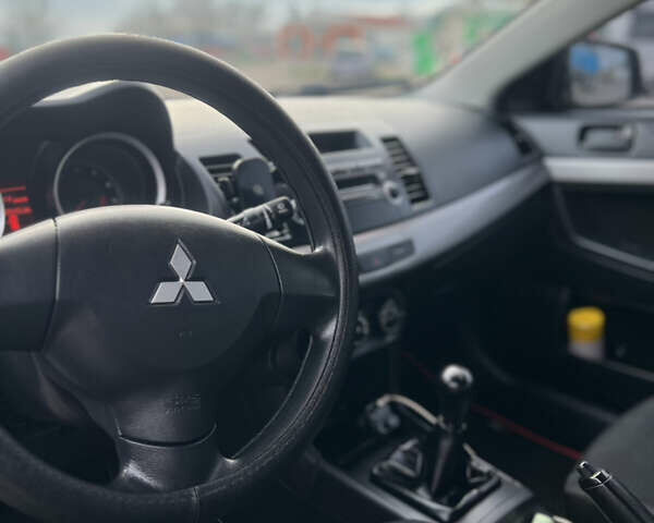 Чорний Міцубісі Lancer, об'ємом двигуна 1.5 л та пробігом 209 тис. км за 5500 $, фото 23 на Automoto.ua