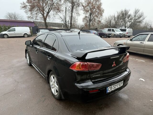 Черный Мицубиси Лансер, объемом двигателя 2 л и пробегом 281 тыс. км за 6000 $, фото 6 на Automoto.ua
