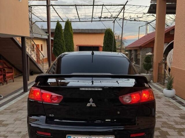 Черный Мицубиси Лансер, объемом двигателя 2 л и пробегом 247 тыс. км за 4700 $, фото 5 на Automoto.ua