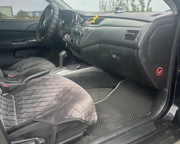 Чорний Міцубісі Lancer, об'ємом двигуна 1.6 л та пробігом 310 тис. км за 5100 $, фото 13 на Automoto.ua