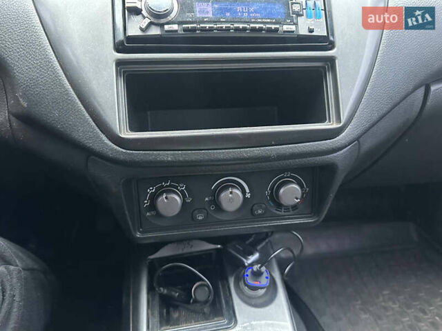 Черный Мицубиси Лансер, объемом двигателя 1.58 л и пробегом 290 тыс. км за 3000 $, фото 10 на Automoto.ua