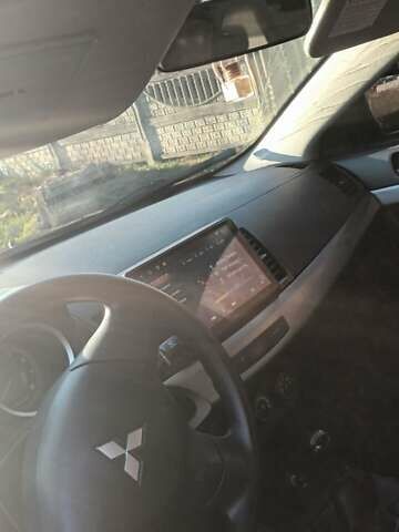 Черный Мицубиси Лансер, объемом двигателя 1.5 л и пробегом 270 тыс. км за 4999 $, фото 2 на Automoto.ua