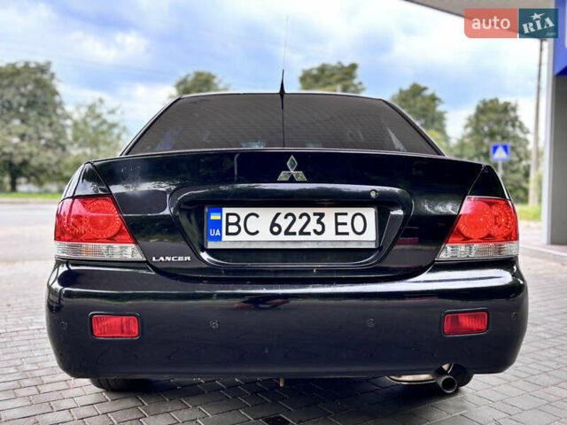 Чорний Міцубісі Lancer, об'ємом двигуна 1.6 л та пробігом 173 тис. км за 3700 $, фото 9 на Automoto.ua