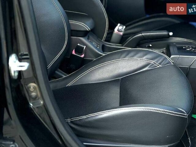 Черный Мицубиси Лансер, объемом двигателя 2 л и пробегом 205 тыс. км за 6500 $, фото 6 на Automoto.ua