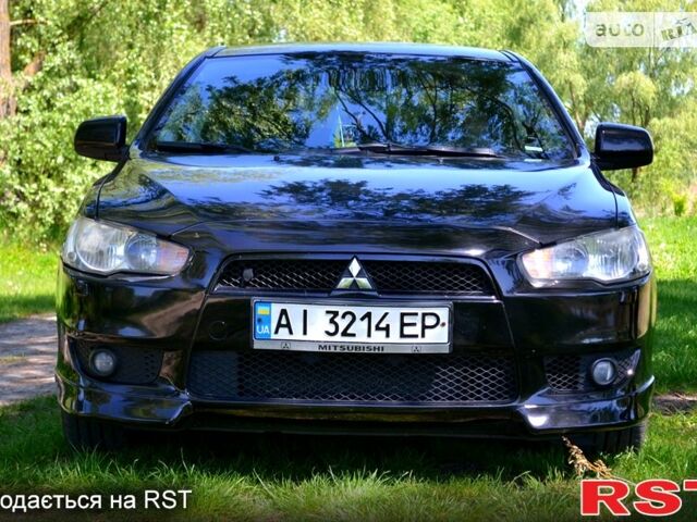 Чорний Міцубісі Lancer, об'ємом двигуна 1.8 л та пробігом 226 тис. км за 6600 $, фото 1 на Automoto.ua