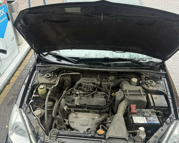 Чорний Міцубісі Lancer, об'ємом двигуна 1.58 л та пробігом 256 тис. км за 3700 $, фото 9 на Automoto.ua