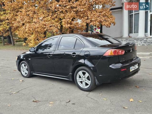 Міцубісі Lancer 2007 у Києві на Automoto.ua Чорний Міцубісі Lancer, об'ємом двигуна 2 л та пробігом 115 тис. км за 5000 $, фото 5 на Automoto.ua