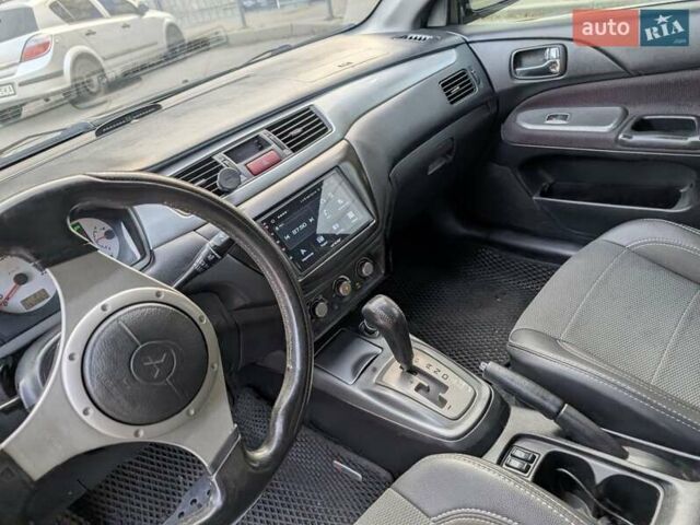 Чорний Міцубісі Lancer, об'ємом двигуна 2 л та пробігом 152 тис. км за 5500 $, фото 16 на Automoto.ua
