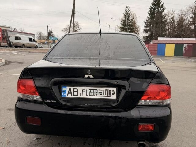 Черный Мицубиси Лансер, объемом двигателя 0 л и пробегом 240 тыс. км за 3300 $, фото 5 на Automoto.ua
