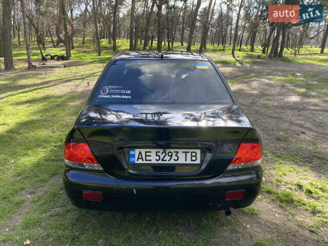 Чорний Міцубісі Lancer, об'ємом двигуна 1.6 л та пробігом 224 тис. км за 4950 $, фото 8 на Automoto.ua