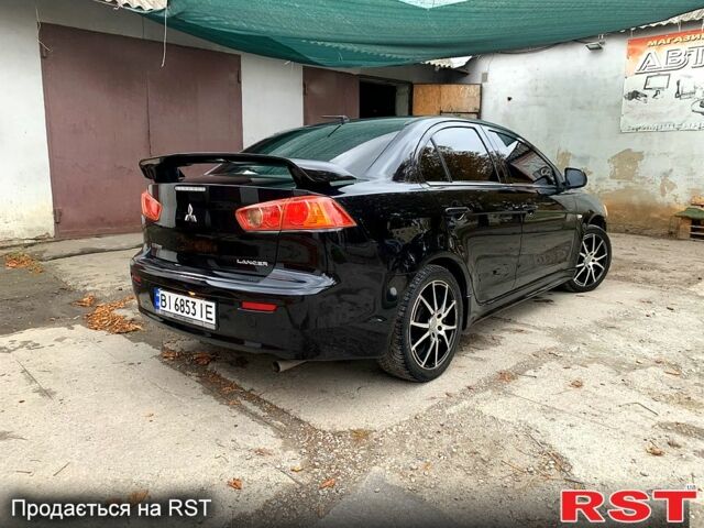 Мицубиси Лансер 2007 в Кобеляках на Automoto.ua Черный Мицубиси Лансер, объемом двигателя 1.8 л и пробегом 235 тыс. км за 6100 $, фото 2 на Automoto.ua