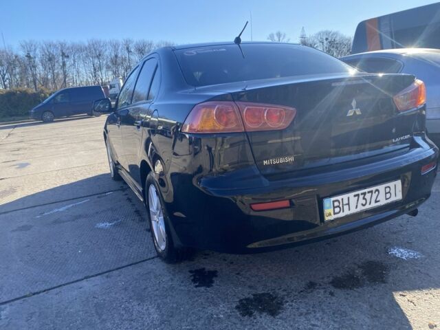 Черный Мицубиси Лансер, объемом двигателя 2 л и пробегом 372 тыс. км за 6200 $, фото 4 на Automoto.ua