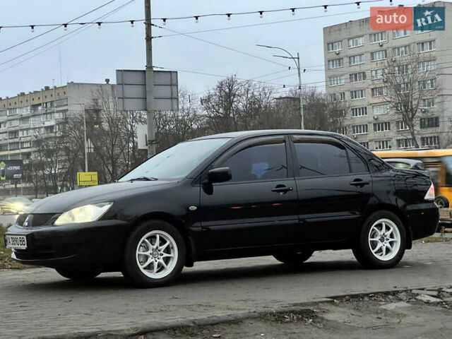Чорний Міцубісі Lancer, об'ємом двигуна 1.6 л та пробігом 303 тис. км за 4350 $, фото 5 на Automoto.ua