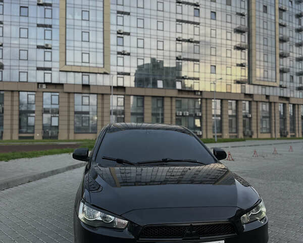 Черный Мицубиси Лансер, объемом двигателя 2 л и пробегом 245 тыс. км за 6200 $, фото 2 на Automoto.ua