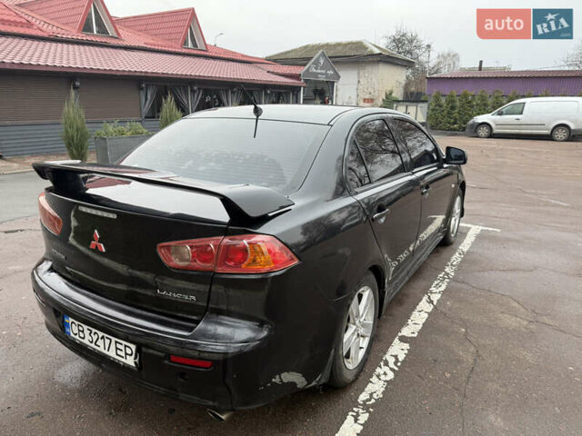 Чорний Міцубісі Lancer, об'ємом двигуна 2 л та пробігом 281 тис. км за 6000 $, фото 8 на Automoto.ua