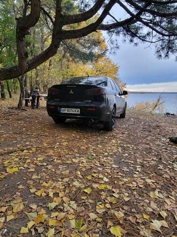 Черный Мицубиси Лансер, объемом двигателя 2 л и пробегом 260 тыс. км за 5500 $, фото 3 на Automoto.ua