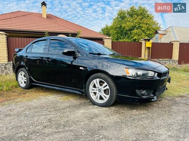 Чорний Міцубісі Lancer, об'ємом двигуна 2 л та пробігом 284 тис. км за 6200 $, фото 2 на Automoto.ua