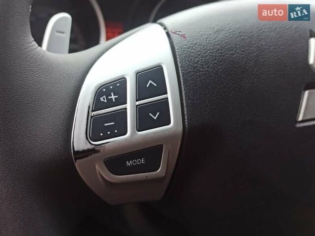 Черный Мицубиси Лансер, объемом двигателя 2 л и пробегом 195 тыс. км за 7899 $, фото 19 на Automoto.ua