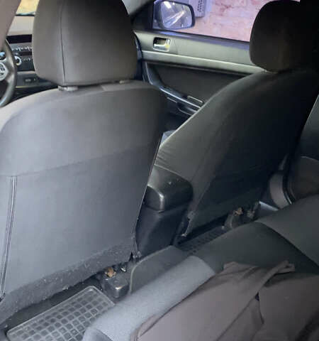 Чорний Міцубісі Lancer, об'ємом двигуна 2 л та пробігом 280 тис. км за 5200 $, фото 7 на Automoto.ua