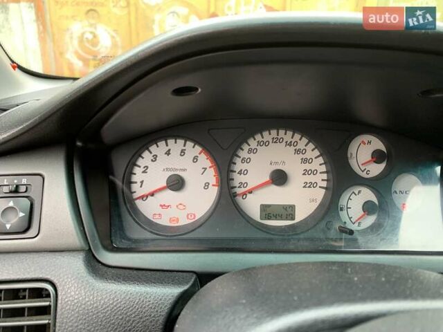 Черный Мицубиси Лансер, объемом двигателя 1.6 л и пробегом 164 тыс. км за 5200 $, фото 13 на Automoto.ua