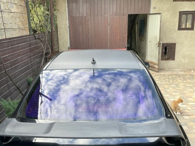 Чорний Міцубісі Lancer, об'ємом двигуна 2 л та пробігом 175 тис. км за 6500 $, фото 6 на Automoto.ua