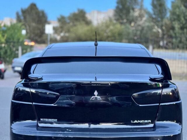 Чорний Міцубісі Lancer, об'ємом двигуна 2 л та пробігом 200 тис. км за 3850 $, фото 5 на Automoto.ua