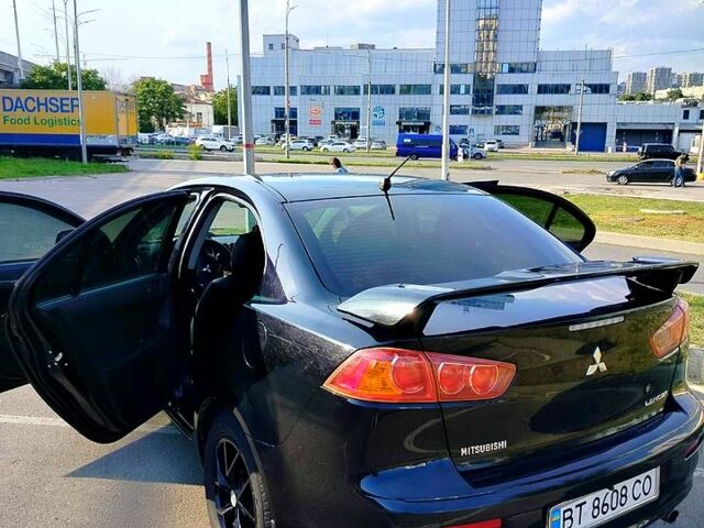 Черный Мицубиси Лансер, объемом двигателя 1.5 л и пробегом 215 тыс. км за 5600 $, фото 5 на Automoto.ua