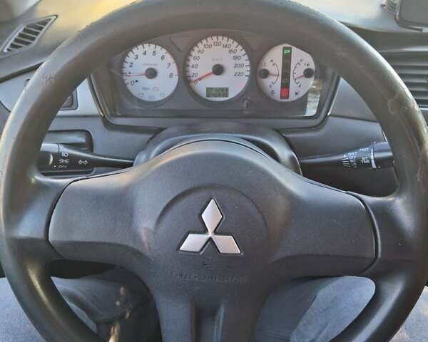 Міцубісі Lancer 2007 у Чернівцях на Automoto.ua Чорний Міцубісі Lancer, об'ємом двигуна 1.58 л та пробігом 247 тис. км за 4300 $, фото 10 на Automoto.ua