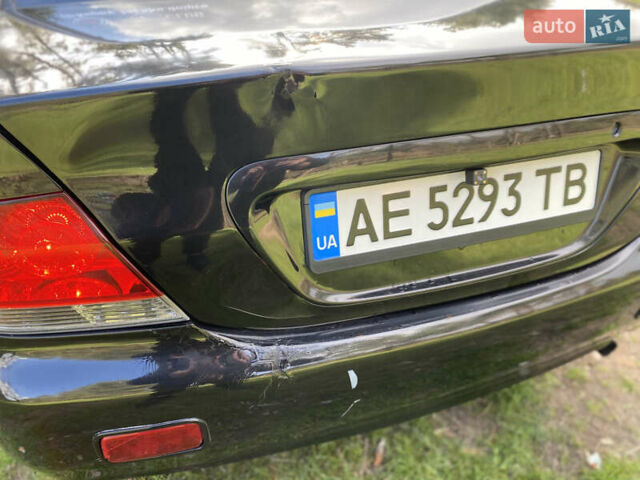 Чорний Міцубісі Lancer, об'ємом двигуна 1.6 л та пробігом 224 тис. км за 4950 $, фото 10 на Automoto.ua