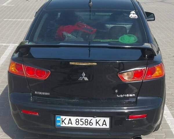 Чорний Міцубісі Lancer, об'ємом двигуна 2 л та пробігом 194 тис. км за 6500 $, фото 7 на Automoto.ua