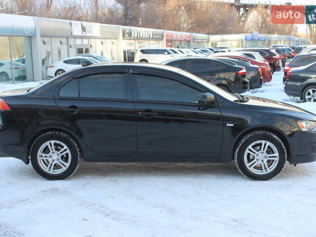 Черный Мицубиси Лансер, объемом двигателя 1.5 л и пробегом 206 тыс. км за 6999 $, фото 6 на Automoto.ua