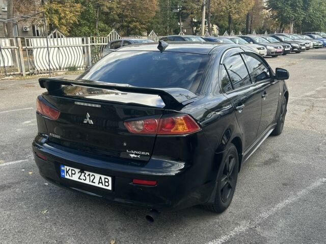 Мицубиси Лансер 2007 в Запорожье на Automoto.ua Черный Мицубиси Лансер, объемом двигателя 2 л и пробегом 208 тыс. км за 6800 $, фото 4 на Automoto.ua