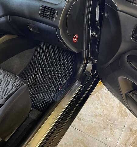 Черный Мицубиси Лансер, объемом двигателя 1.6 л и пробегом 249 тыс. км за 5000 $, фото 14 на Automoto.ua