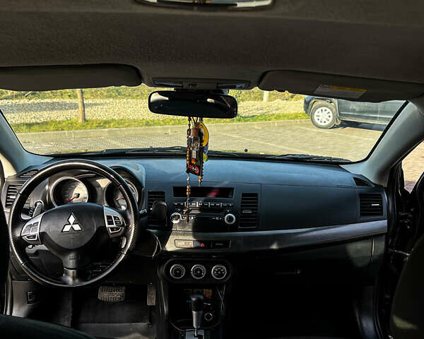 Черный Мицубиси Лансер, объемом двигателя 2 л и пробегом 333 тыс. км за 7300 $, фото 8 на Automoto.ua