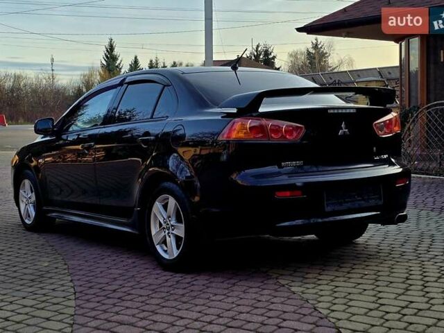 Чорний Міцубісі Lancer, об'ємом двигуна 2 л та пробігом 260 тис. км за 6555 $, фото 9 на Automoto.ua