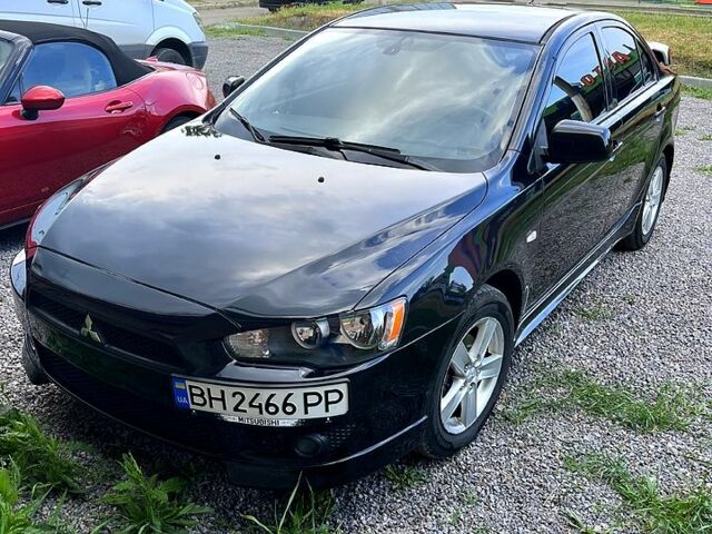 Чорний Міцубісі Lancer, об'ємом двигуна 2 л та пробігом 230 тис. км за 6900 $, фото 1 на Automoto.ua