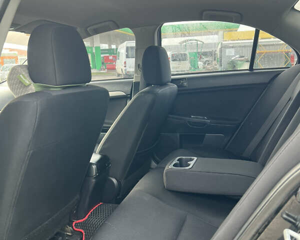 Чорний Міцубісі Lancer, об'ємом двигуна 1.5 л та пробігом 209 тис. км за 5500 $, фото 21 на Automoto.ua