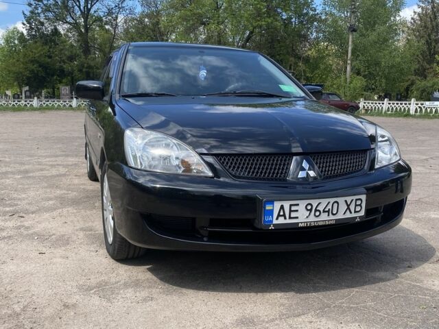 Чорний Міцубісі Lancer, об'ємом двигуна 0.16 л та пробігом 156 тис. км за 5100 $, фото 1 на Automoto.ua