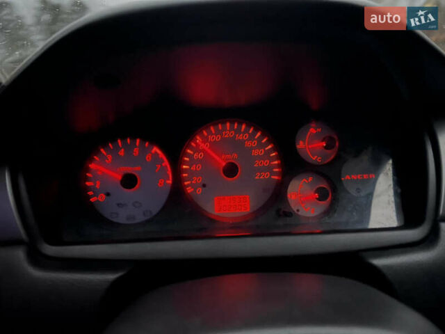 Чорний Міцубісі Lancer, об'ємом двигуна 1.6 л та пробігом 303 тис. км за 4350 $, фото 33 на Automoto.ua