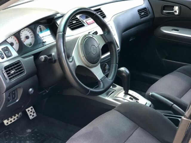 Чорний Міцубісі Lancer, об'ємом двигуна 2 л та пробігом 170 тис. км за 5650 $, фото 2 на Automoto.ua