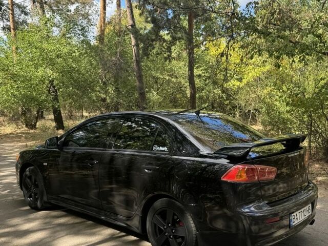 Черный Мицубиси Лансер, объемом двигателя 2 л и пробегом 280 тыс. км за 6800 $, фото 3 на Automoto.ua