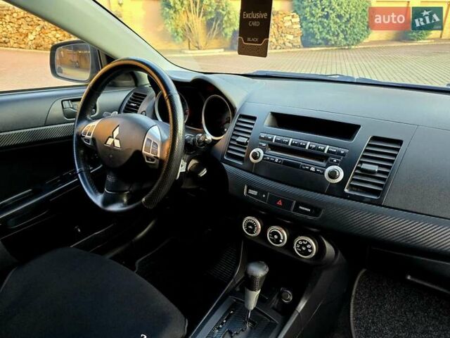 Чорний Міцубісі Lancer, об'ємом двигуна 2 л та пробігом 260 тис. км за 6555 $, фото 32 на Automoto.ua