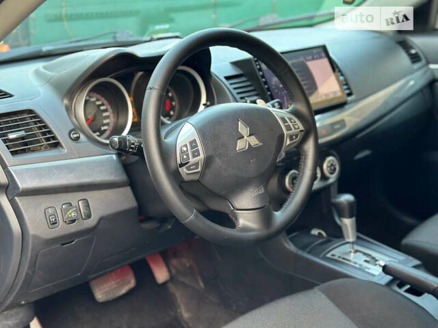 Чорний Міцубісі Lancer, об'ємом двигуна 2 л та пробігом 220 тис. км за 7700 $, фото 7 на Automoto.ua