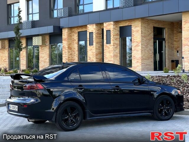 Чорний Міцубісі Lancer, об'ємом двигуна 2 л та пробігом 205 тис. км за 6500 $, фото 2 на Automoto.ua