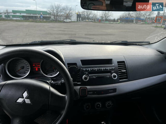 Чорний Міцубісі Lancer, об'ємом двигуна 1.5 л та пробігом 209 тис. км за 5500 $, фото 19 на Automoto.ua