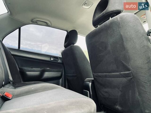Чорний Міцубісі Lancer, об'ємом двигуна 1.6 л та пробігом 243 тис. км за 4950 $, фото 46 на Automoto.ua