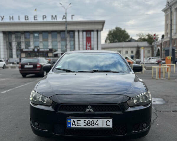 Черный Мицубиси Лансер, объемом двигателя 1.5 л и пробегом 300 тыс. км за 5800 $, фото 1 на Automoto.ua