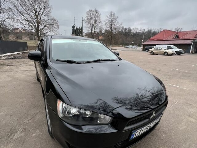 Чорний Міцубісі Lancer, об'ємом двигуна 2 л та пробігом 214 тис. км за 6800 $, фото 1 на Automoto.ua