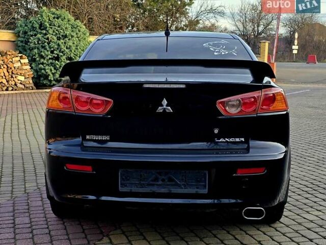 Чорний Міцубісі Lancer, об'ємом двигуна 2 л та пробігом 260 тис. км за 6555 $, фото 6 на Automoto.ua