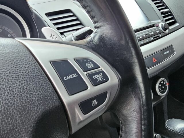 Черный Мицубиси Лансер, объемом двигателя 2 л и пробегом 115 тыс. км за 5000 $, фото 21 на Automoto.ua